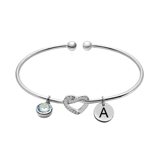 Bracciale a forma di cuore inciso con pietra portafortuna in argento 